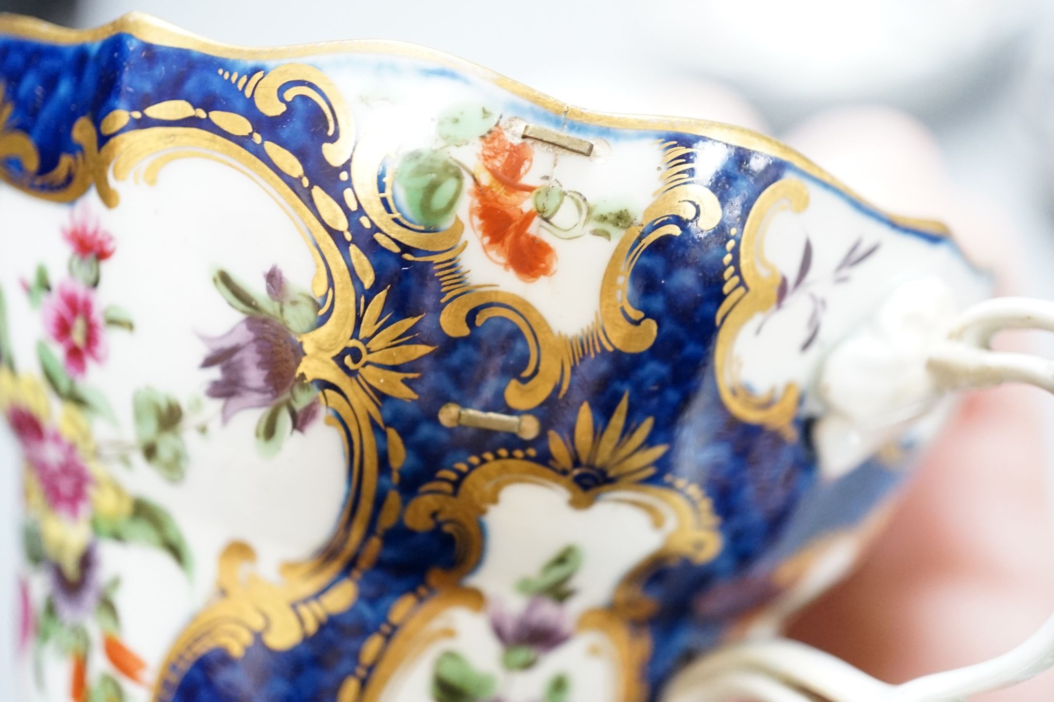 A Worcester scale blue chocolate cup and saucer and a pair of similar tea bowls and saucers, circa 1775